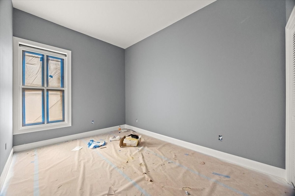 150 Purchase Street Fall River, MA 02720 - Photo 17 of 42 an empty room with a window