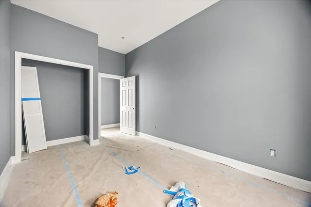 a bathroom with a shower and toilet
