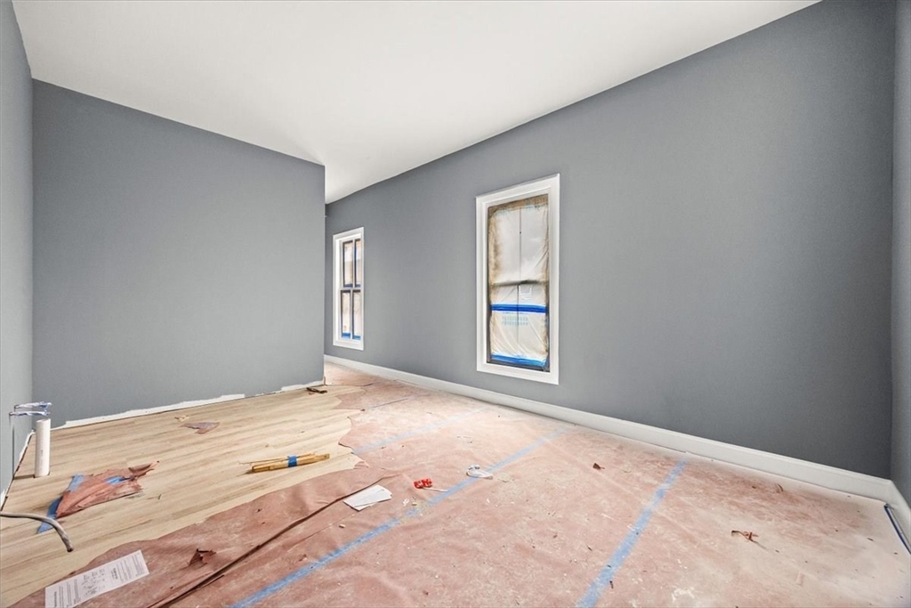 150 Purchase Street Fall River, MA 02720 - Photo 6 of 42 a view of a bedroom and window