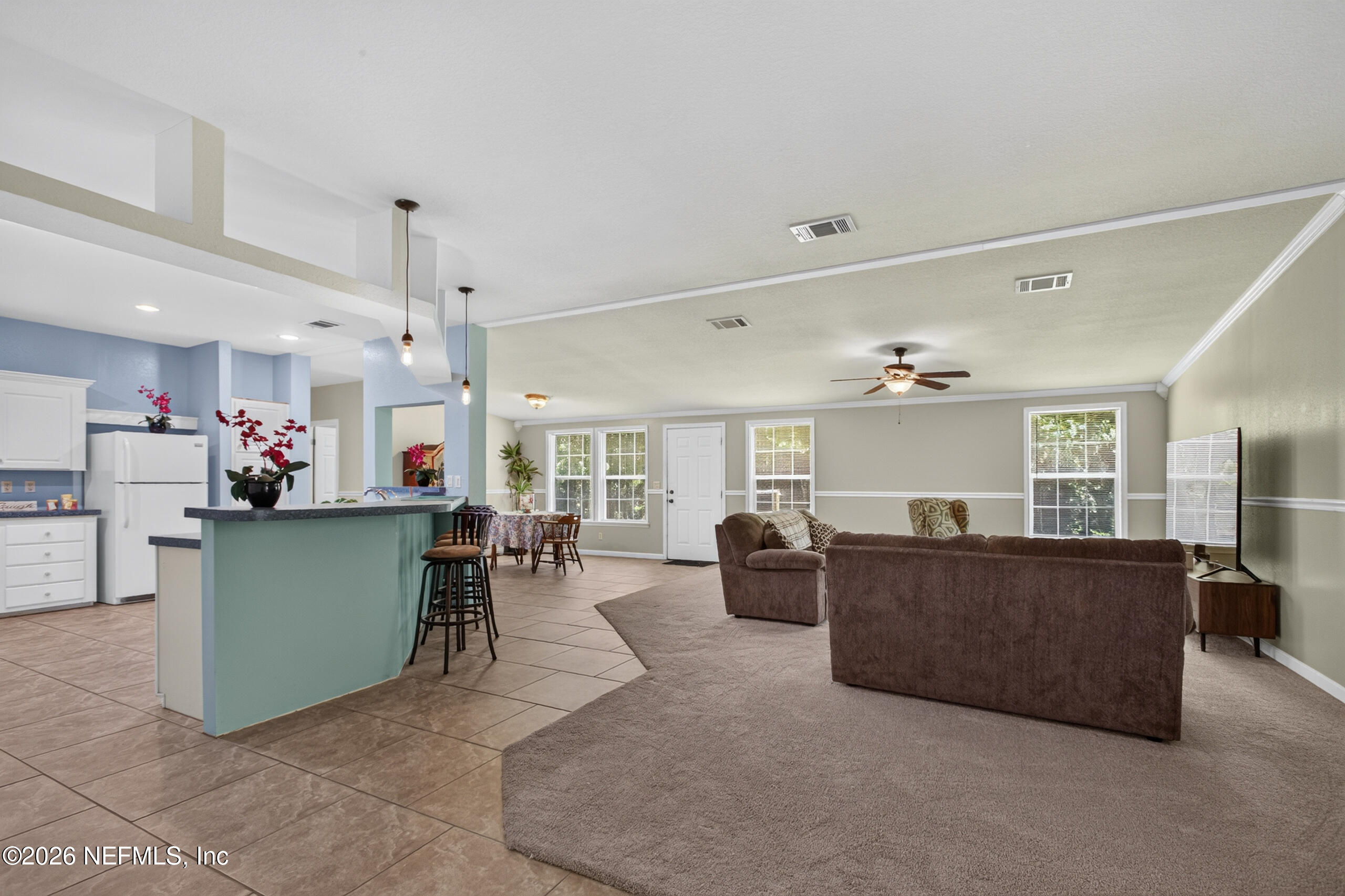 2817 Haddock Road Jacksonville, FL 32218 - Photo 16 of 77 Foyer to Living and Kitchen