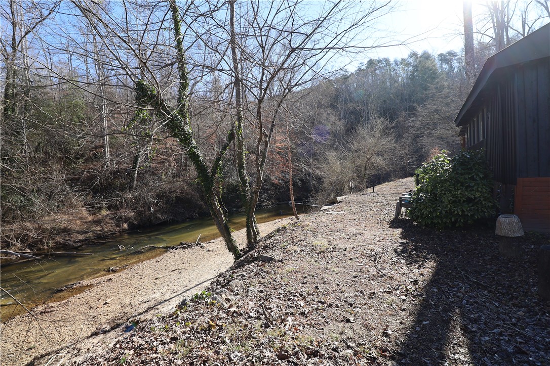 200 Laurel And Hardy Lake Road Marietta, SC 29661 - Photo 20 of 47 This tranquil setting offers direct river frontage and peaceful woodland views.