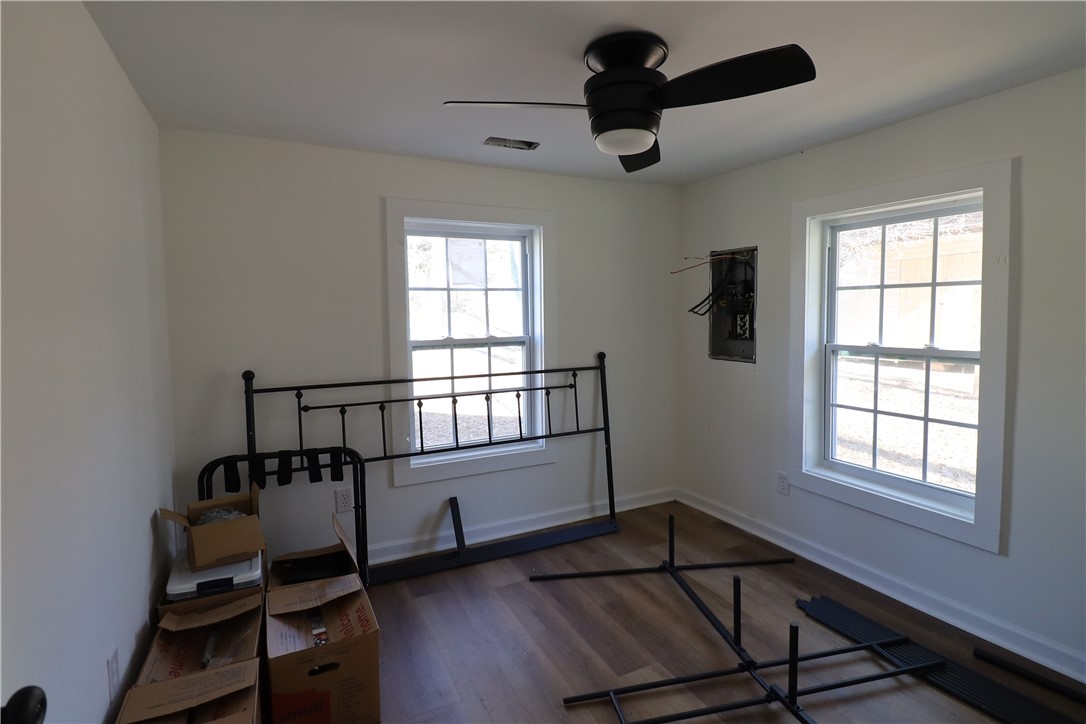 200 Laurel And Hardy Lake Road Marietta, SC 29661 - Photo 37 of 47 This bright bedroom offers ample natural light and a comfortable ambiance.