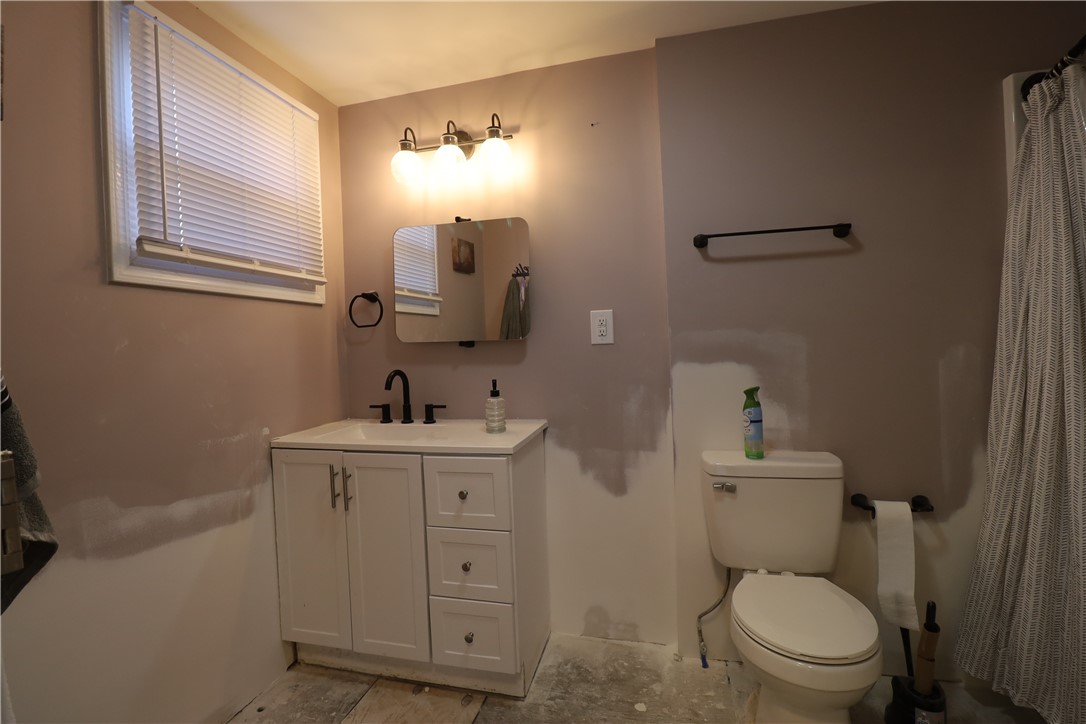 200 Laurel And Hardy Lake Road Marietta, SC 29661 - Photo 10 of 47 This bright bathroom features a modern vanity and essential fixtures for comfortable daily routines.