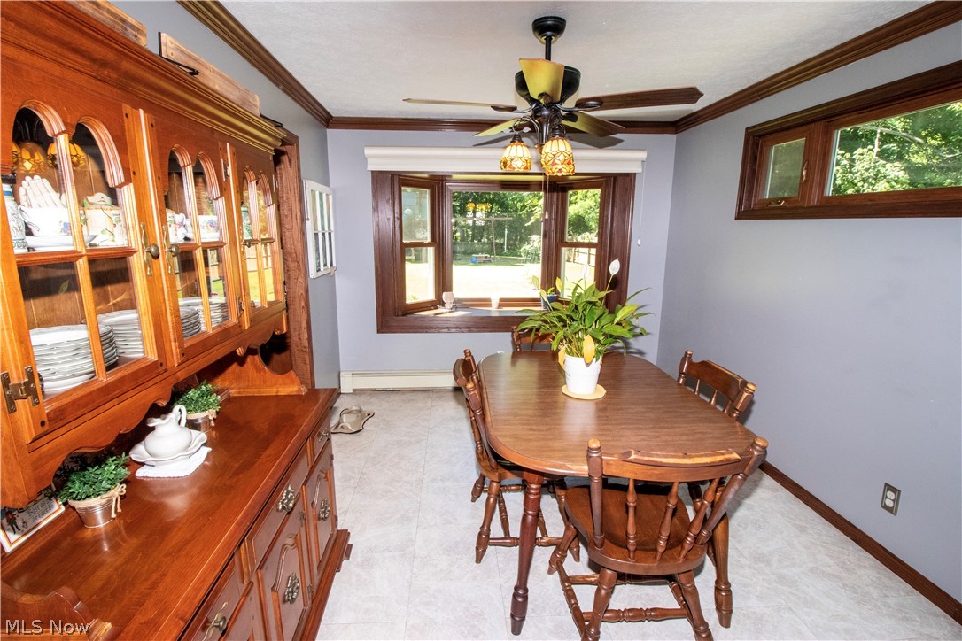 5480 Lockwood Road Madison, OH 44057 - Photo 6 of 30 Dining room with matching bay window