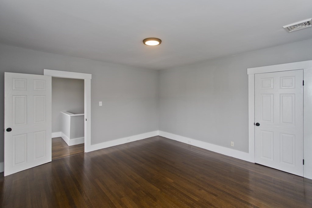 85 Chapel Street Warren, MA 01092 - Photo 26 of 42 a view of an empty room with wooden floor and closet