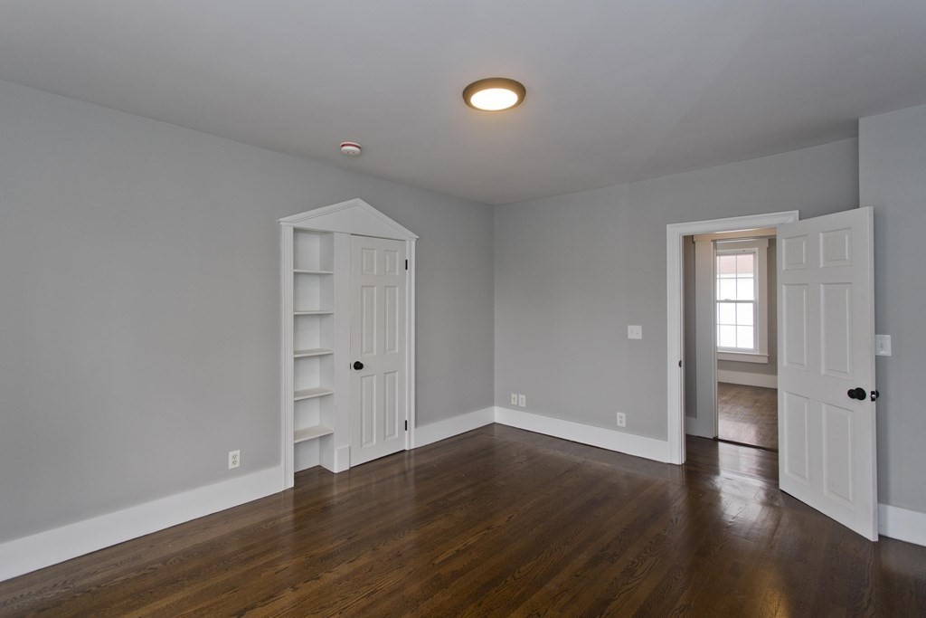 85 Chapel Street Warren, MA 01092 - Photo 30 of 42 wooden floor in an empty room with a window