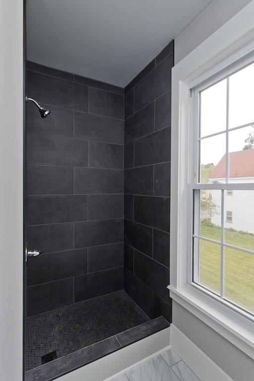 85 Chapel Street Warren, MA 01092 - Photo 35 of 42 a bathroom with a glass shower door