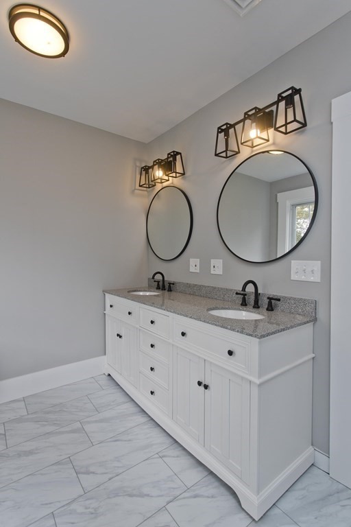 85 Chapel Street Warren, MA 01092 - Photo 36 of 42 a bathroom with a toilet sink and mirror