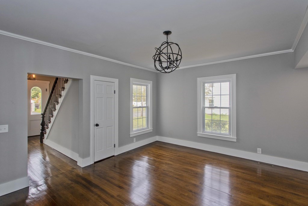 85 Chapel Street Warren, MA 01092 - Photo 10 of 42 a view of an empty room with wooden floor and a window