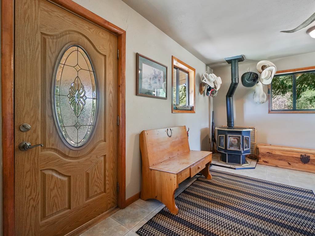 4805 Cedar Road Delta, CO 81416 - Photo 20 of 36 a view of a livingroom with furniture and a mirror