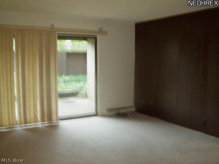 9956 Johnnycake Ridge Road, Unit L3 Painesville, OH 44077 - Photo 7 of 15 Living room