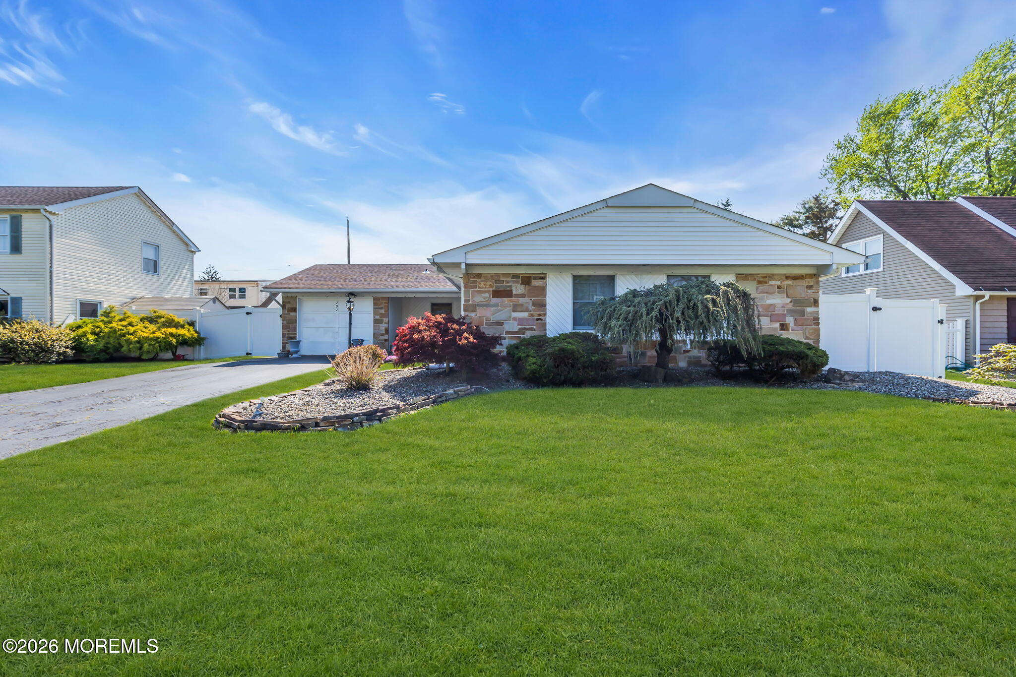 101 Andover Lane Matawan, NJ 07747 - Photo 2 of 51 a front view of a house with a yard