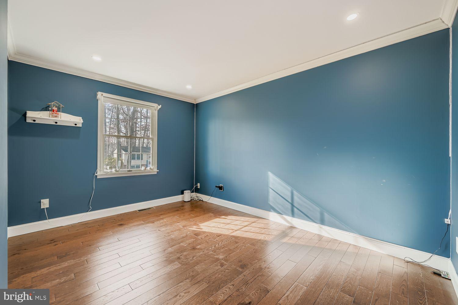 603 Deep Ridge Road Bel Air, MD 21014 - Photo 16 of 35 Bright, airy room with bold blue walls.