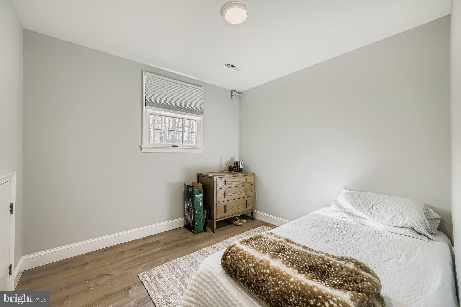 603 Deep Ridge Road Bel Air, MD 21014 - Photo 25 of 35 Cozy, minimalist bedroom with natural light.