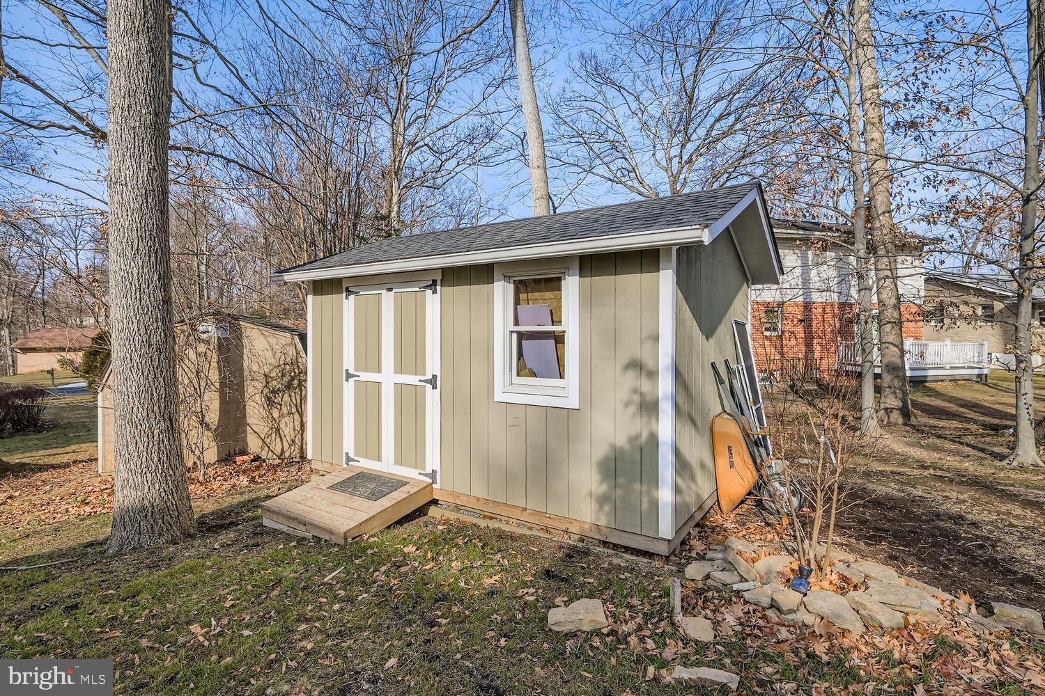 603 Deep Ridge Road Bel Air, MD 21014 - Photo 32 of 35 Charming garden shed nestled among trees.