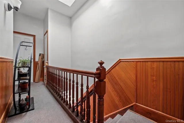 a view of staircase with wooden floor and stairs