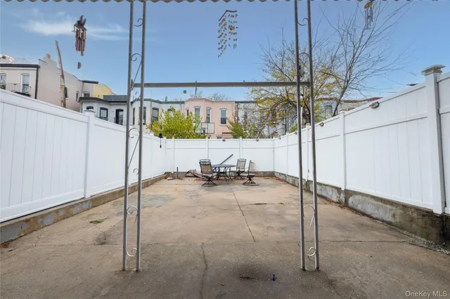 a view of a backyard of the house