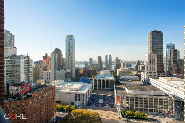a view of city with tall buildings
