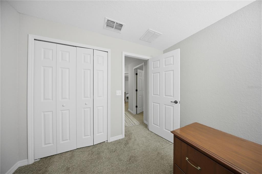 157 Spruce Road Ocala, FL 34472 - Photo 12 of 19 wooden floor and closet in a room