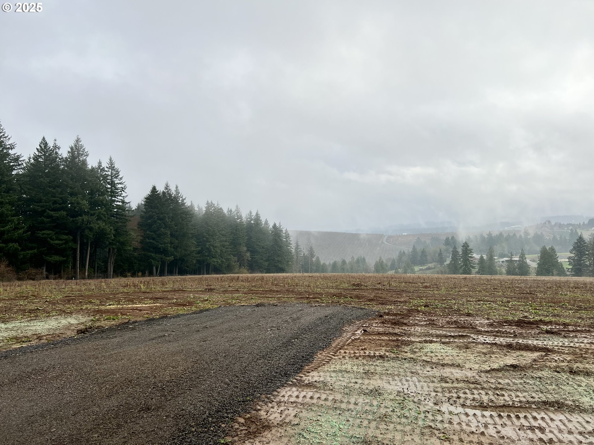 23129 Southwest Jaquith Road Hillsboro, OR 97123 - Photo 2 of 8 a view of a field with wooden fence