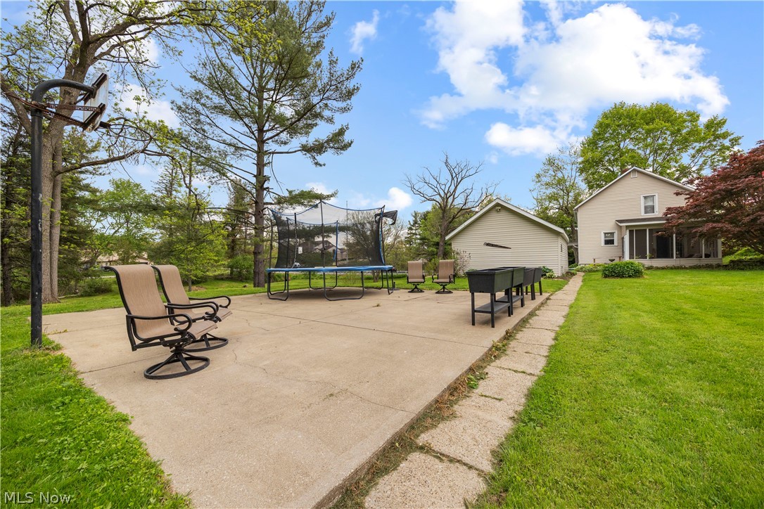 2462 Myersville Road Uniontown, OH 44685 - Photo 31 of 43 Basketball court or concrete patio for cookouts and entertaining