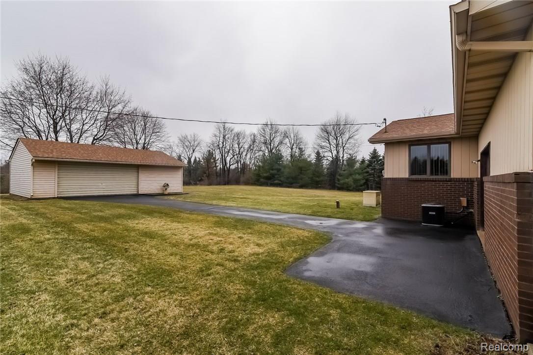200 Mack Road Leonard, MI 48367 - Photo 31 of 42 Backside View.jpg