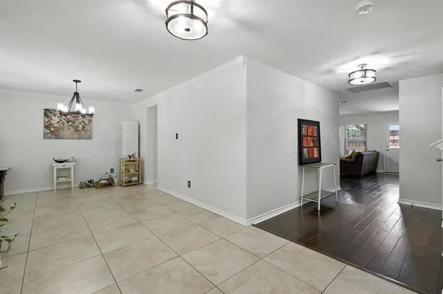 a view of livingroom with workspace and hallway