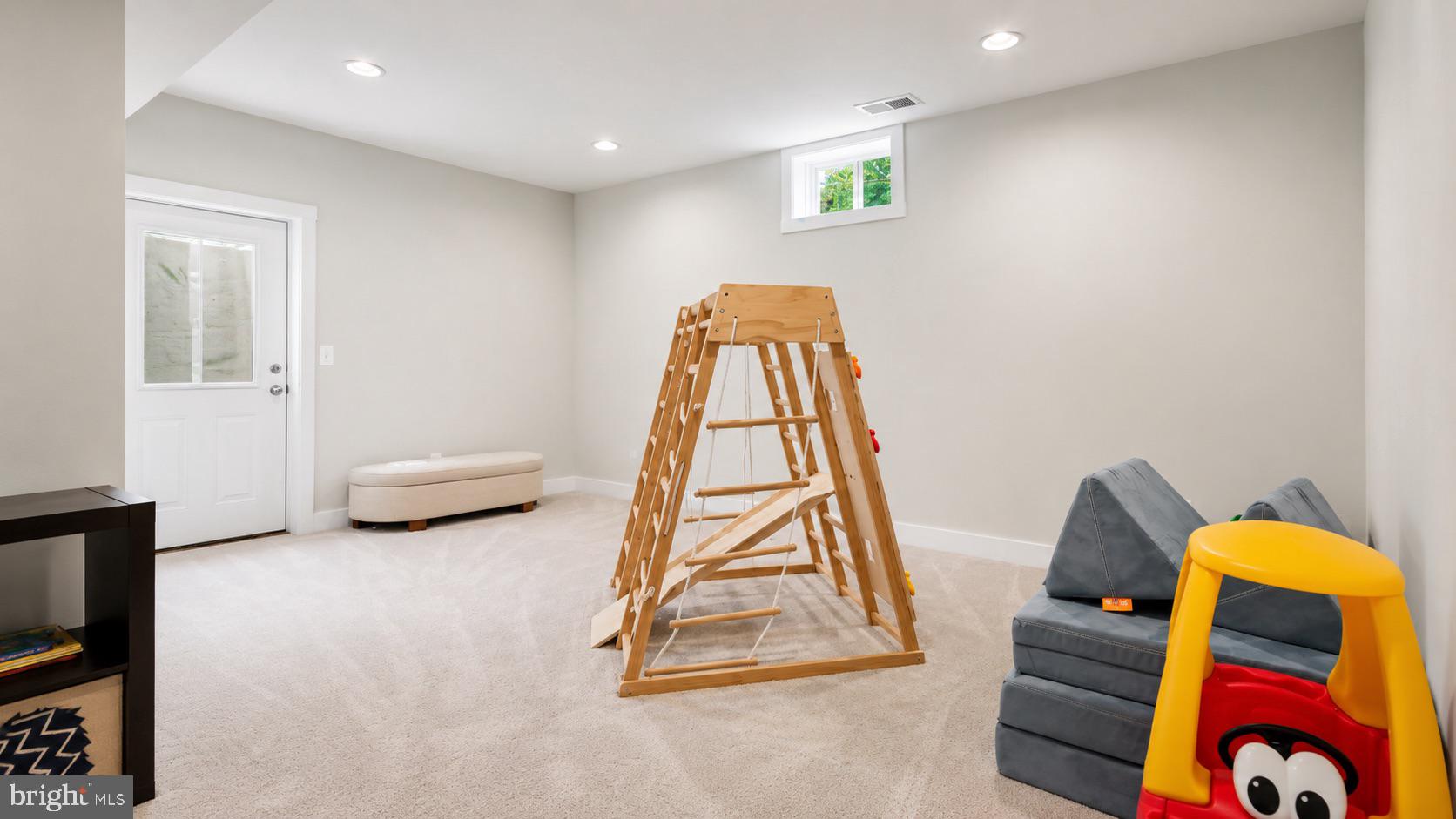 23609 Roselle Ridge Lane Aldie, VA 20105 - Photo 56 of 75 Bright, versatile playroom space.