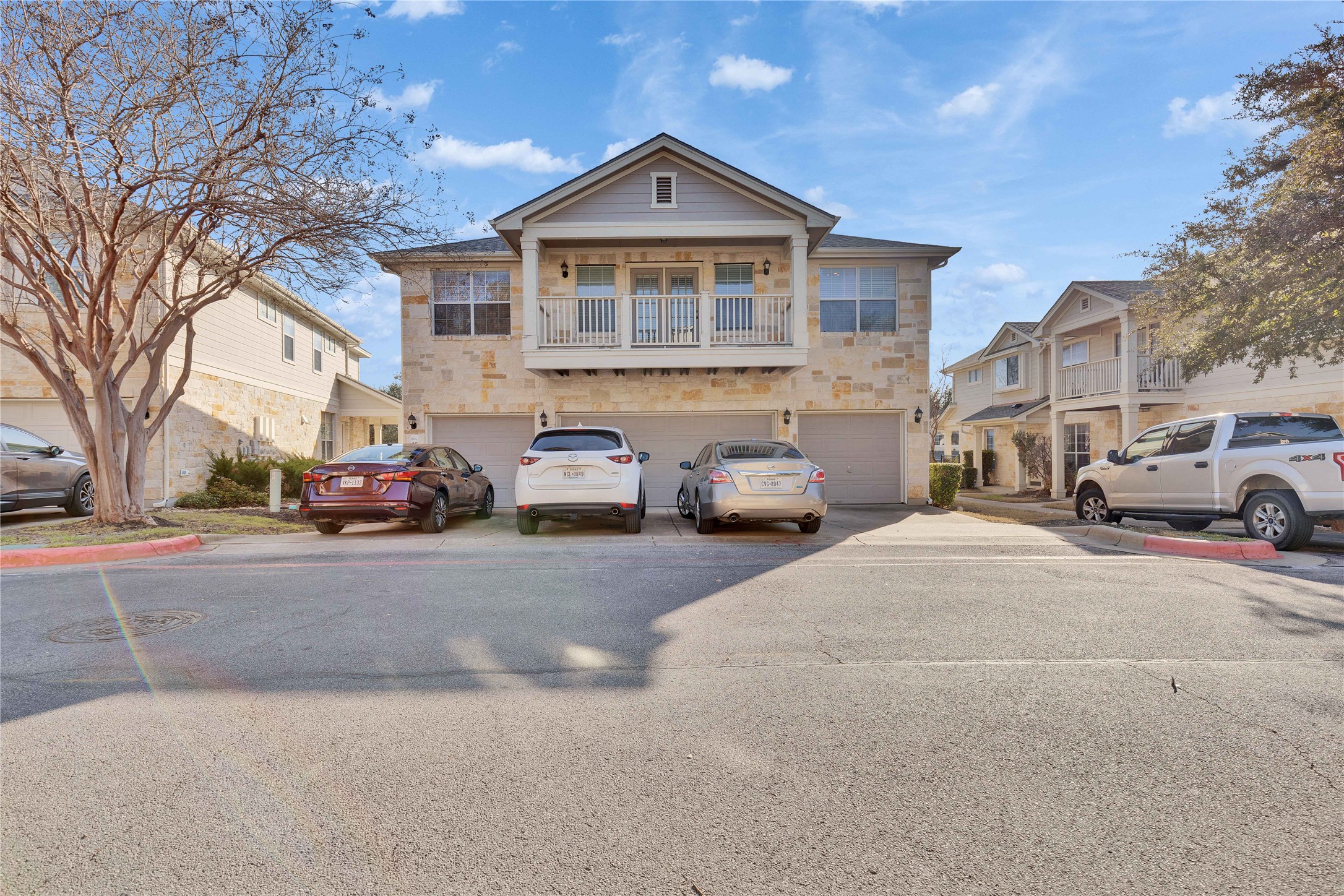 1900 Scofield Ridge Parkway, Unit 2701 Austin, TX 78727 - Photo 10 of 20 a car parked in front of a house