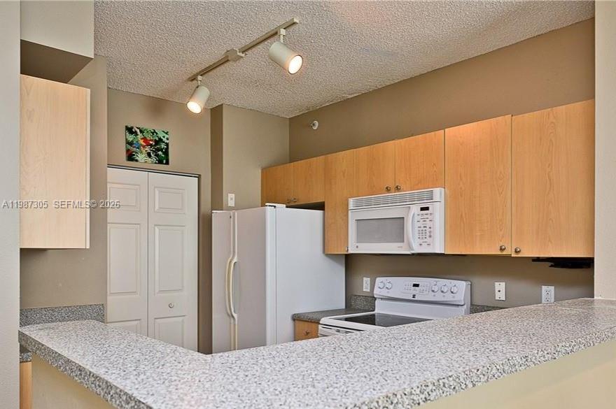 8000 North Nob Hill Road, Unit 107 Tamarac, FL 33321 - Photo 3 of 16