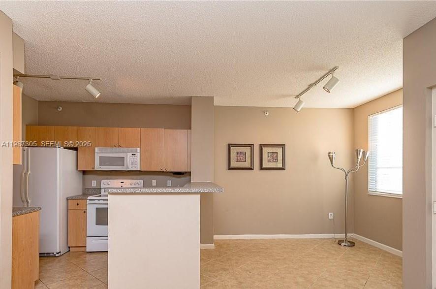 8000 North Nob Hill Road, Unit 107 Tamarac, FL 33321 - Photo 7 of 16
