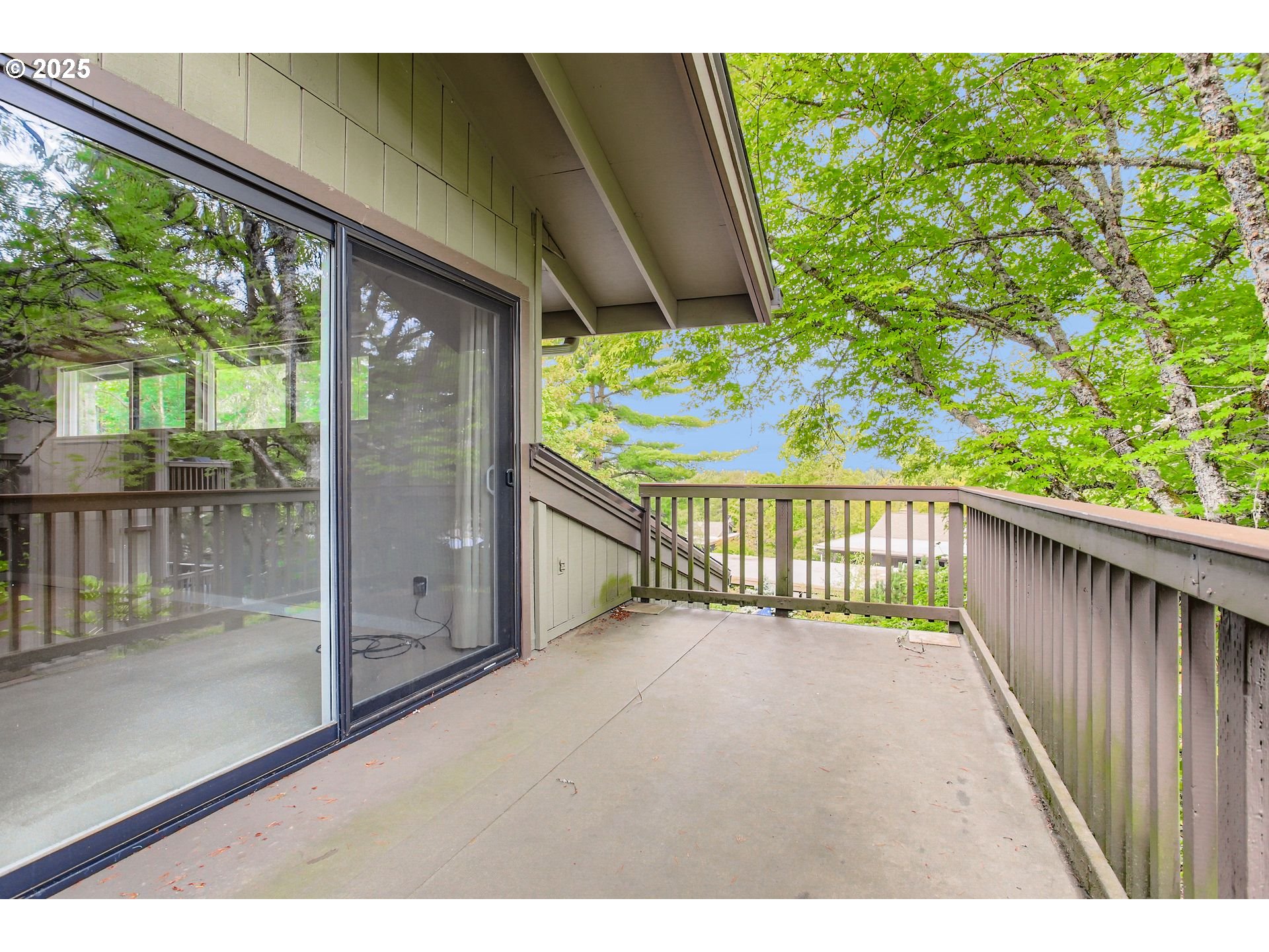7514 Southwest Barnes Road, Unit A Portland, OR 97225 - Photo 19 of 24 a view of a porch