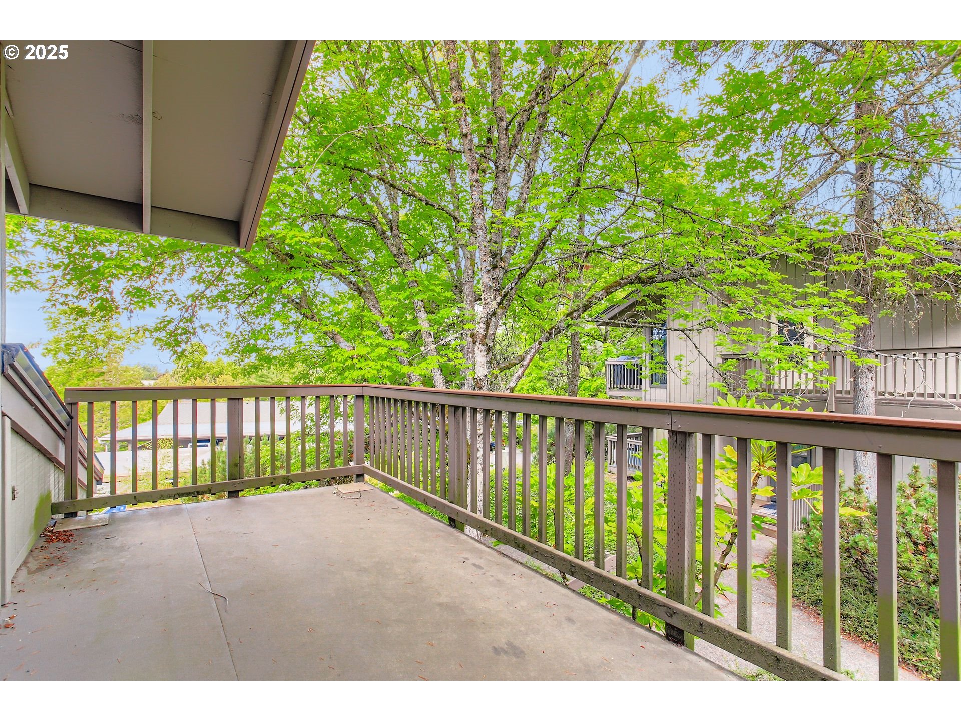 7514 Southwest Barnes Road, Unit A Portland, OR 97225 - Photo 20 of 24 a view of a street
