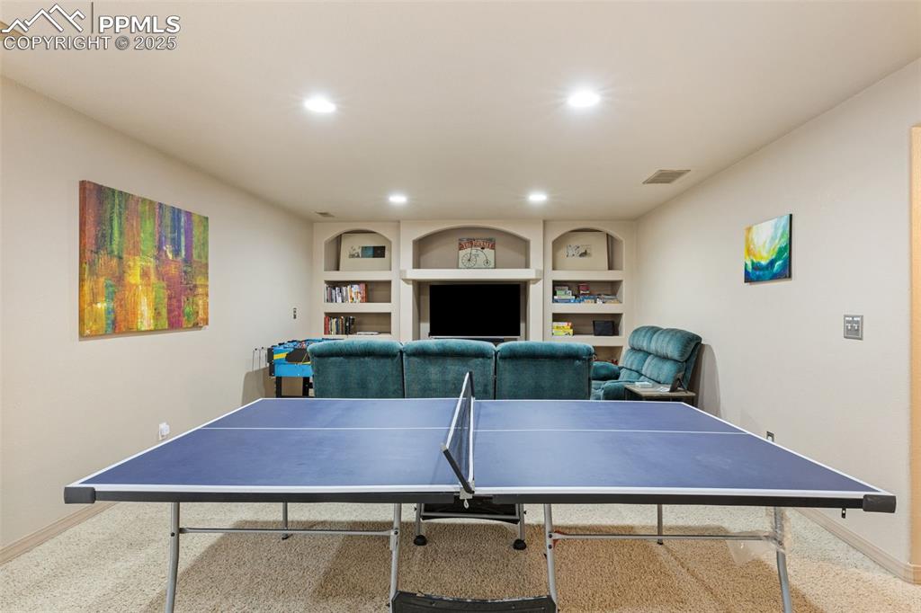 4005 Siferd Boulevard Colorado Springs, CO 80917 - Photo 18 of 27 a view of a house with a chairs and table in a room