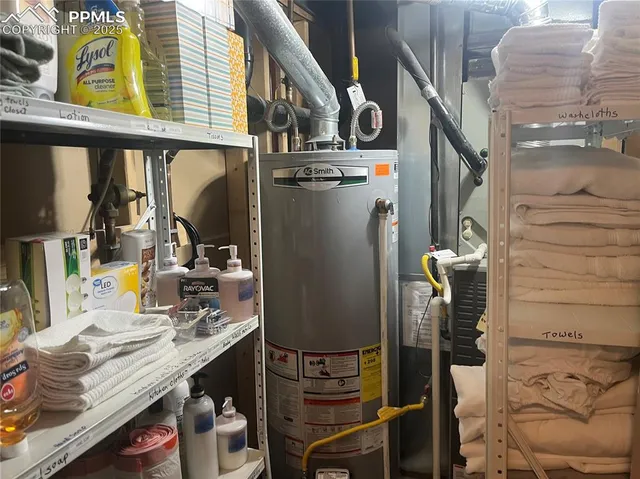 a view of a kitchen with appliances and cabinets
