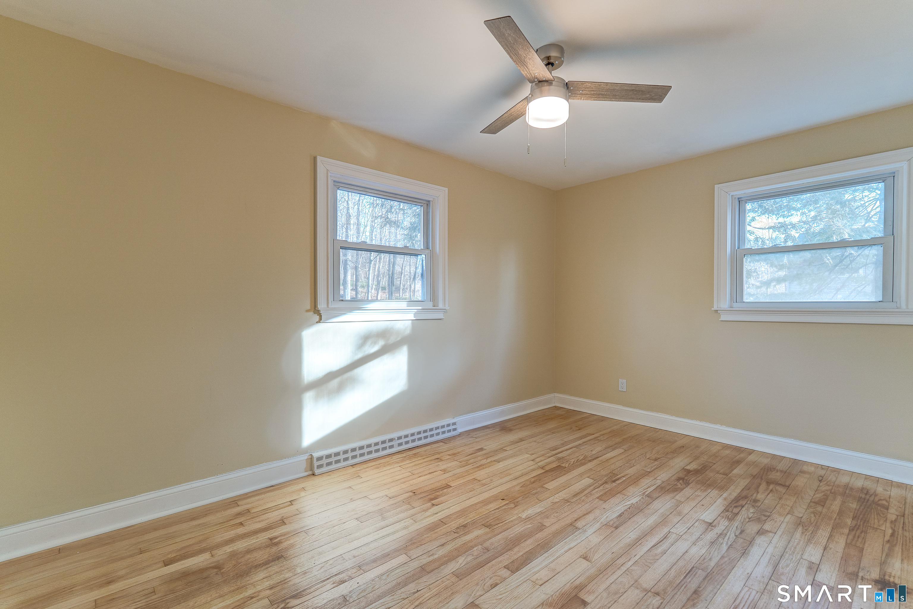 24 Evergreen Road North Branford, CT 06472 - Photo 16 of 24 wooden floor in an empty room with a window