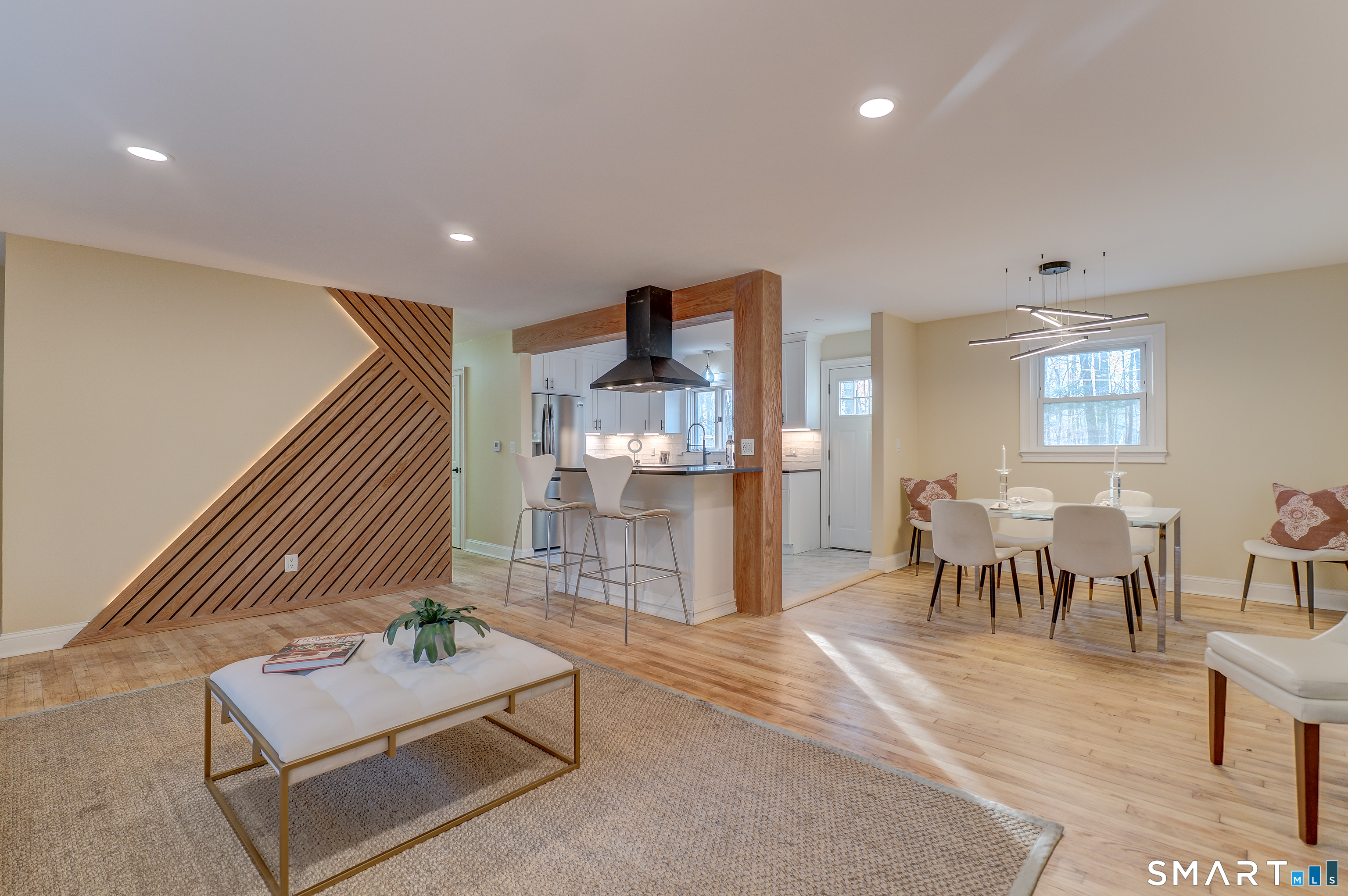 24 Evergreen Road North Branford, CT 06472 - Photo 2 of 24 a living room with furniture and a dining table