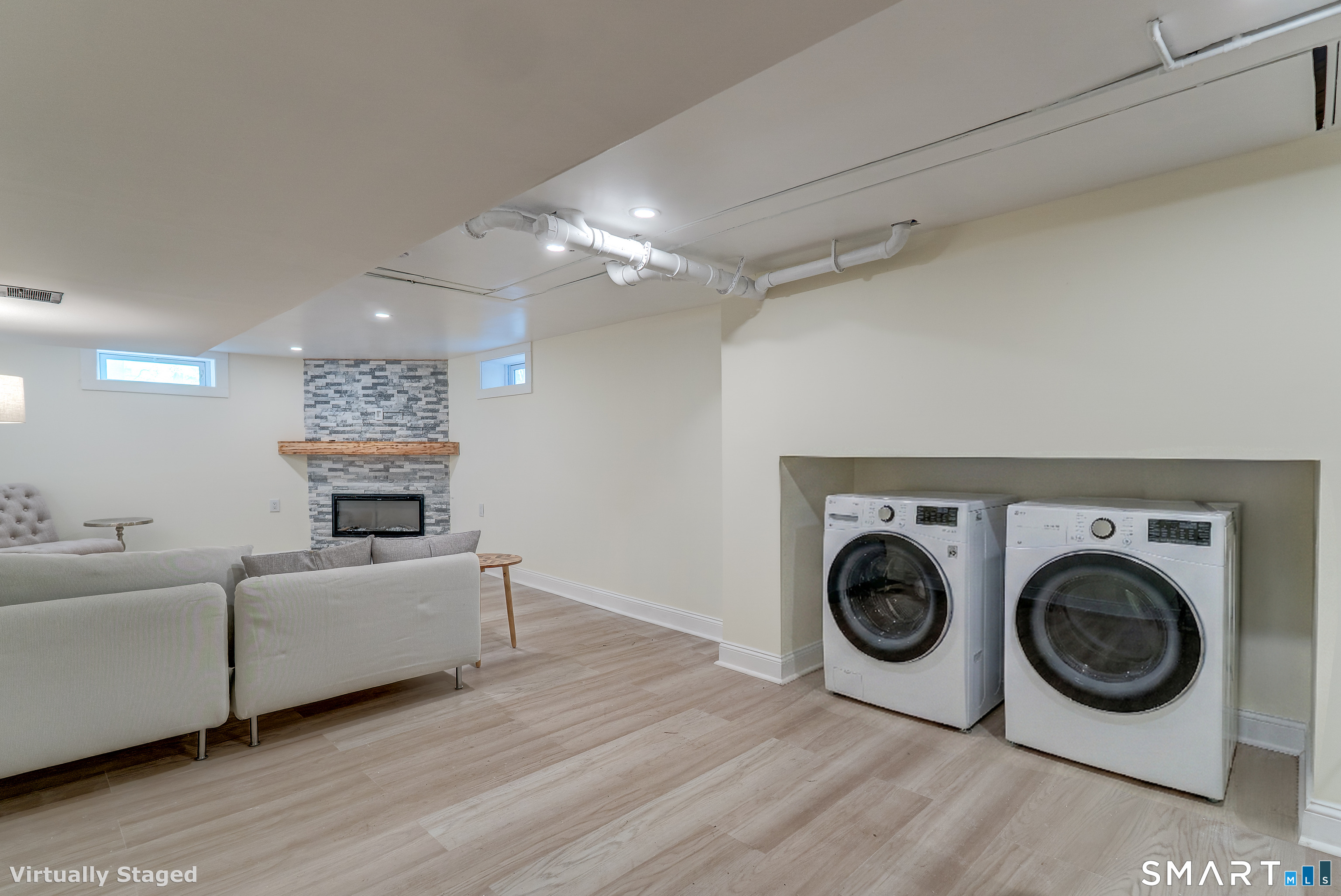 24 Evergreen Road North Branford, CT 06472 - Photo 21 of 24 a living room with furniture and a flat screen tv