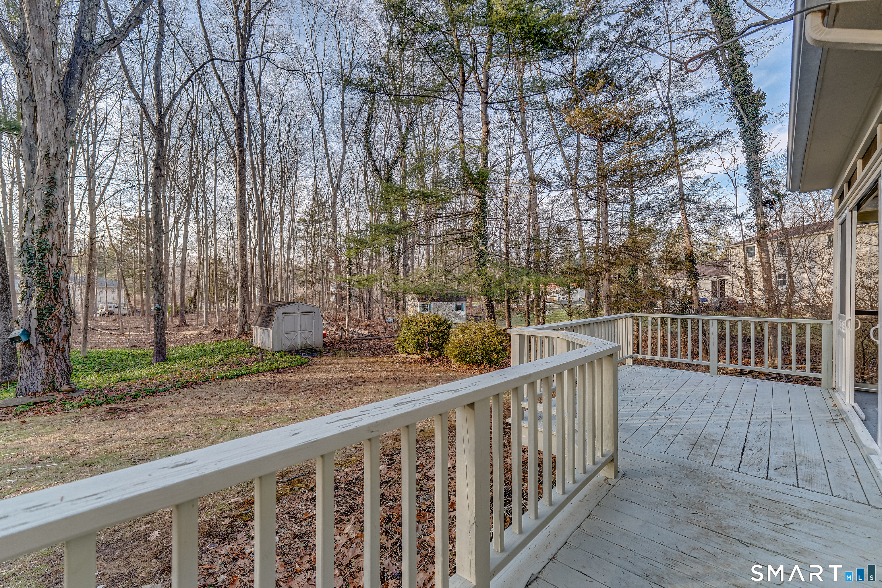 24 Evergreen Road North Branford, CT 06472 - Photo 24 of 24 a view of a balcony with wooden fence and floor