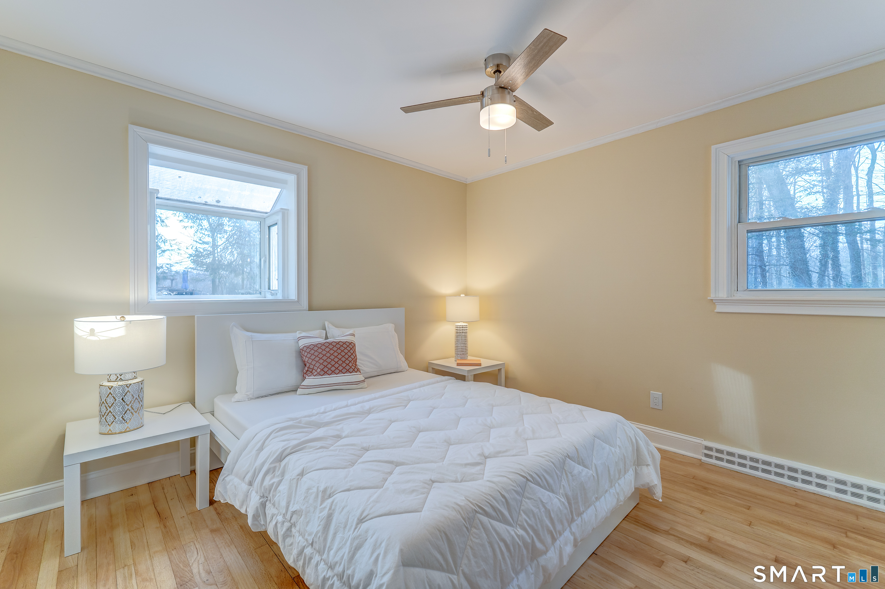 24 Evergreen Road North Branford, CT 06472 - Photo 3 of 24 a bedroom with a bed and a lamp