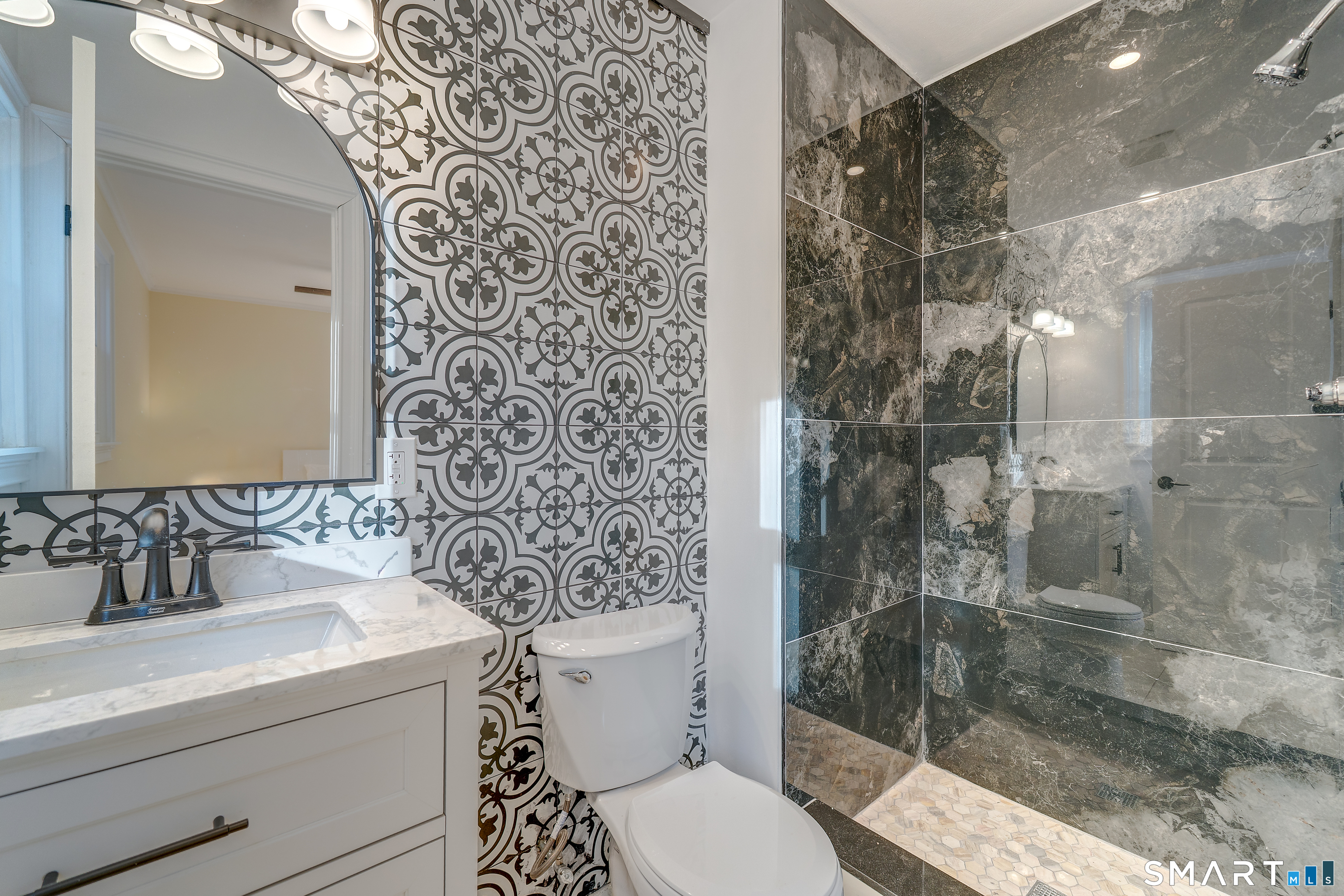 24 Evergreen Road North Branford, CT 06472 - Photo 4 of 24 a bathroom with a sink toilet and shower