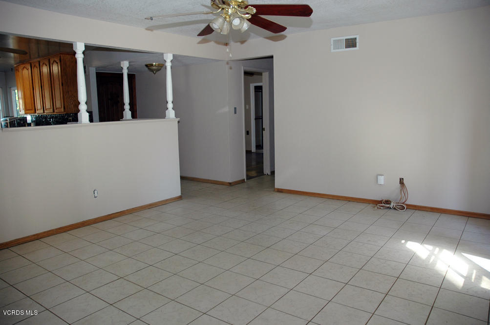 2218 Ralston Street Simi Valley, CA 93063 - Photo 13 of 23 an empty room with chandelier fan