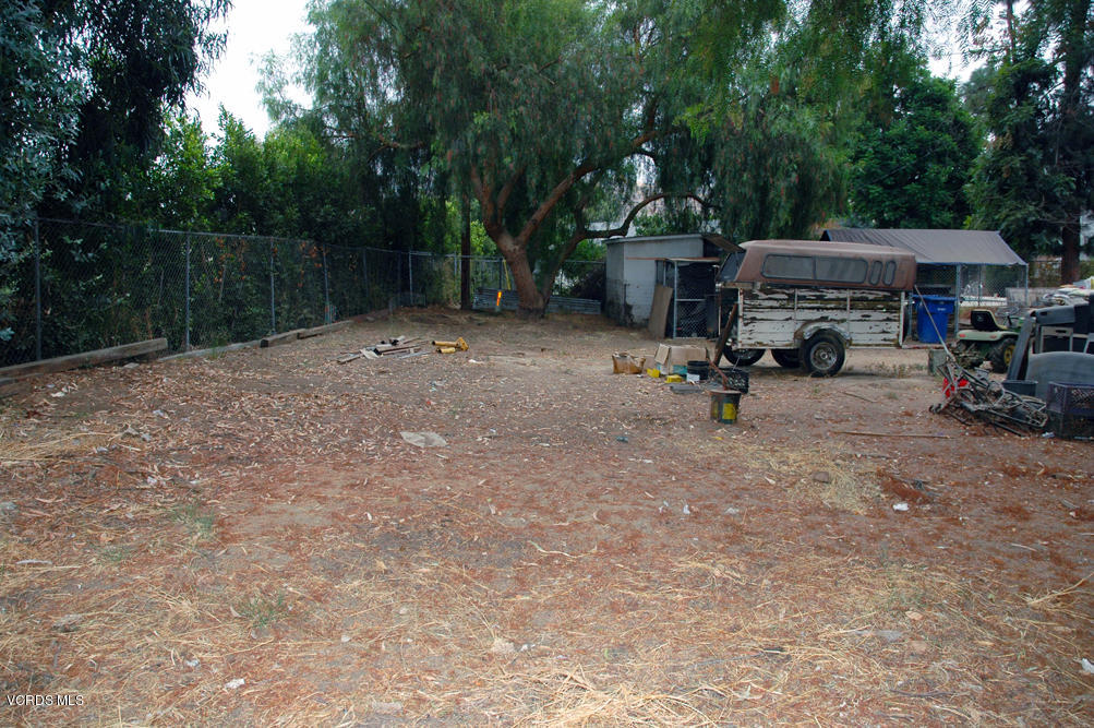2218 Ralston Street Simi Valley, CA 93063 - Photo 20 of 23 a view of a patio with table and chairs with wooden floor and fence