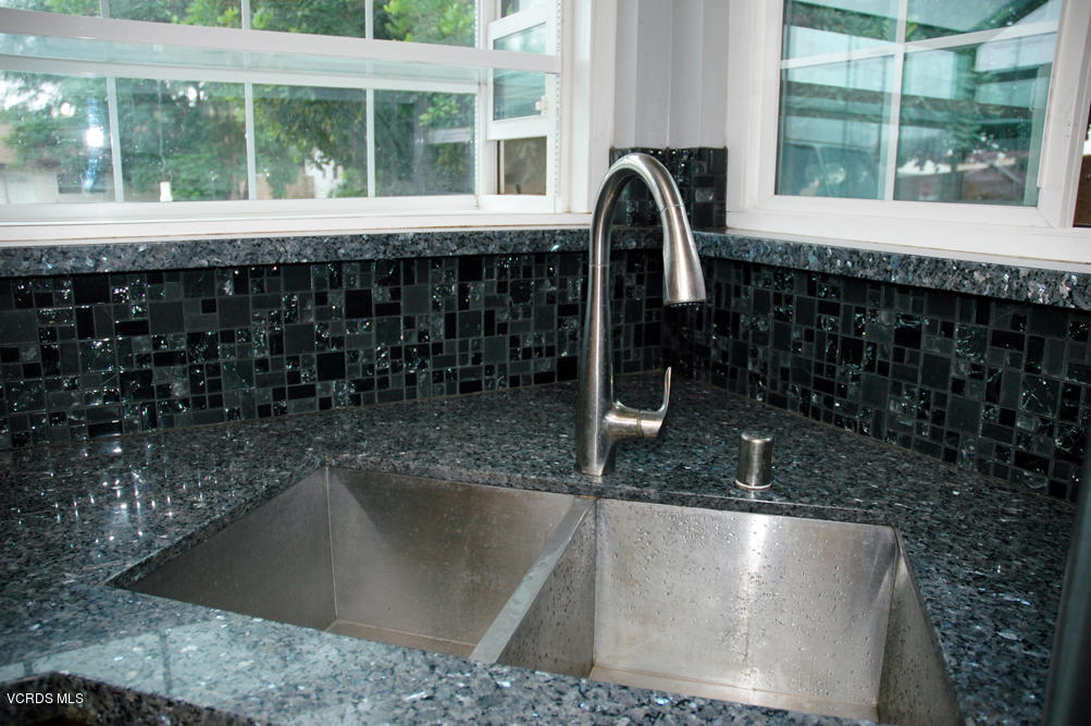 2218 Ralston Street Simi Valley, CA 93063 - Photo 5 of 23 a close view of a sink a faucet and a window