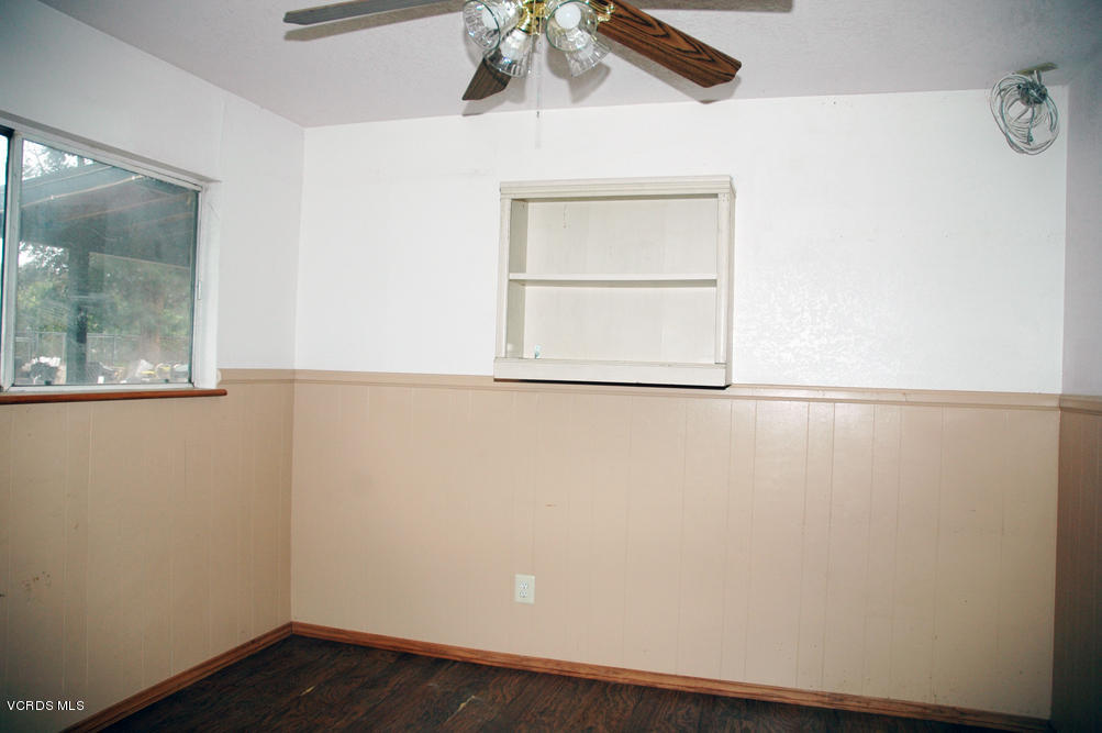 2218 Ralston Street Simi Valley, CA 93063 - Photo 10 of 23 a view of a small space with wooden floor and a window