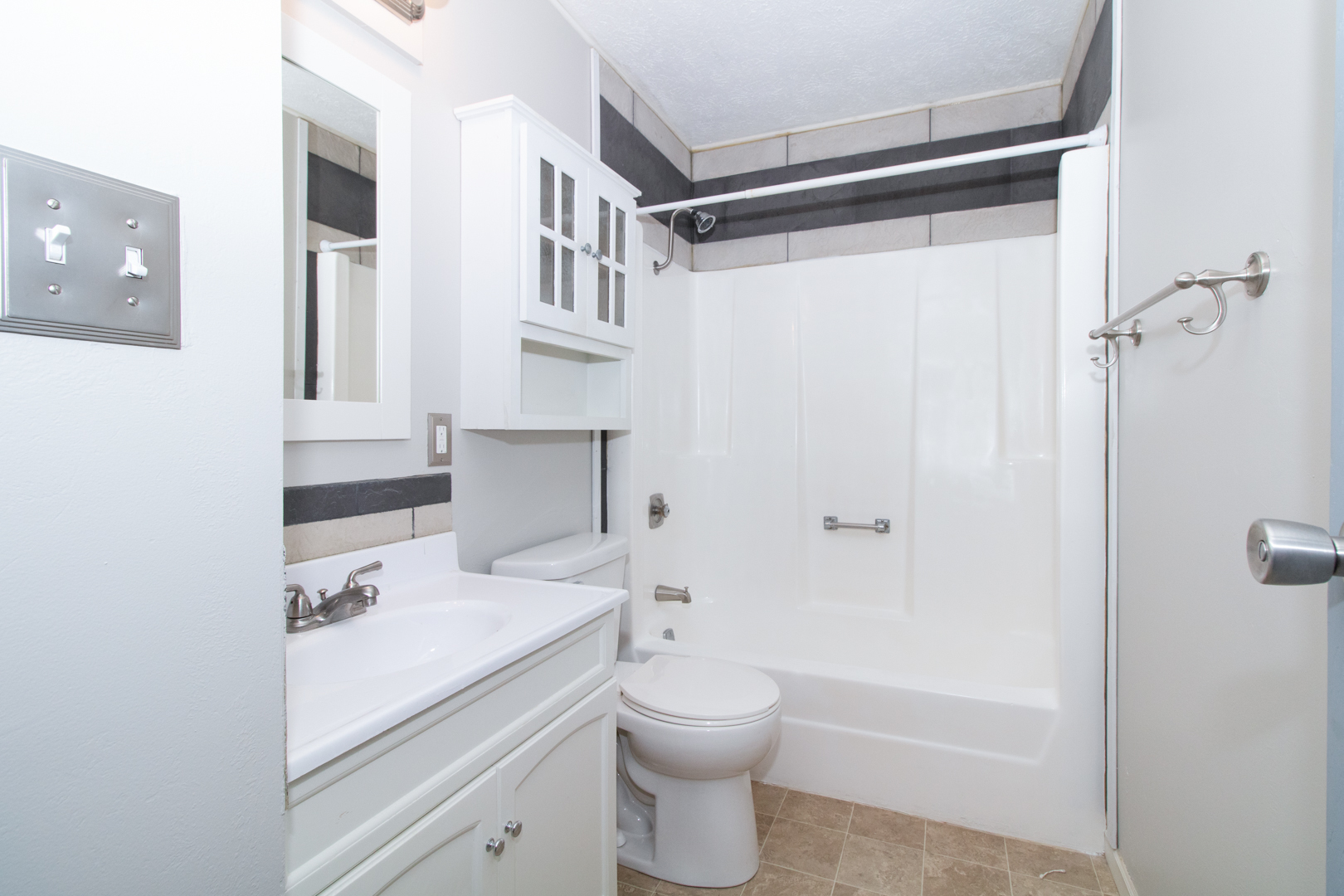 12 Timberview Drive Bloomington, IL 61701 - Photo 13 of 40 a bathroom with a sink a toilet and a shower