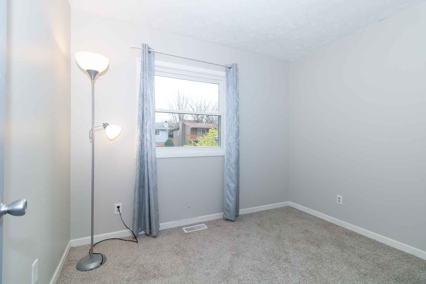 12 Timberview Drive Bloomington, IL 61701 - Photo 14 of 40 an empty room that has a window