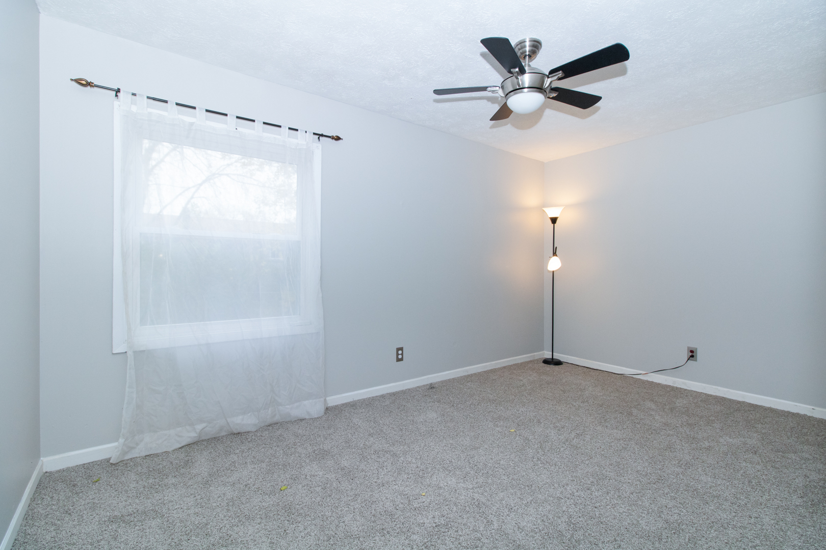 12 Timberview Drive Bloomington, IL 61701 - Photo 21 of 40 a view of an empty room with a window
