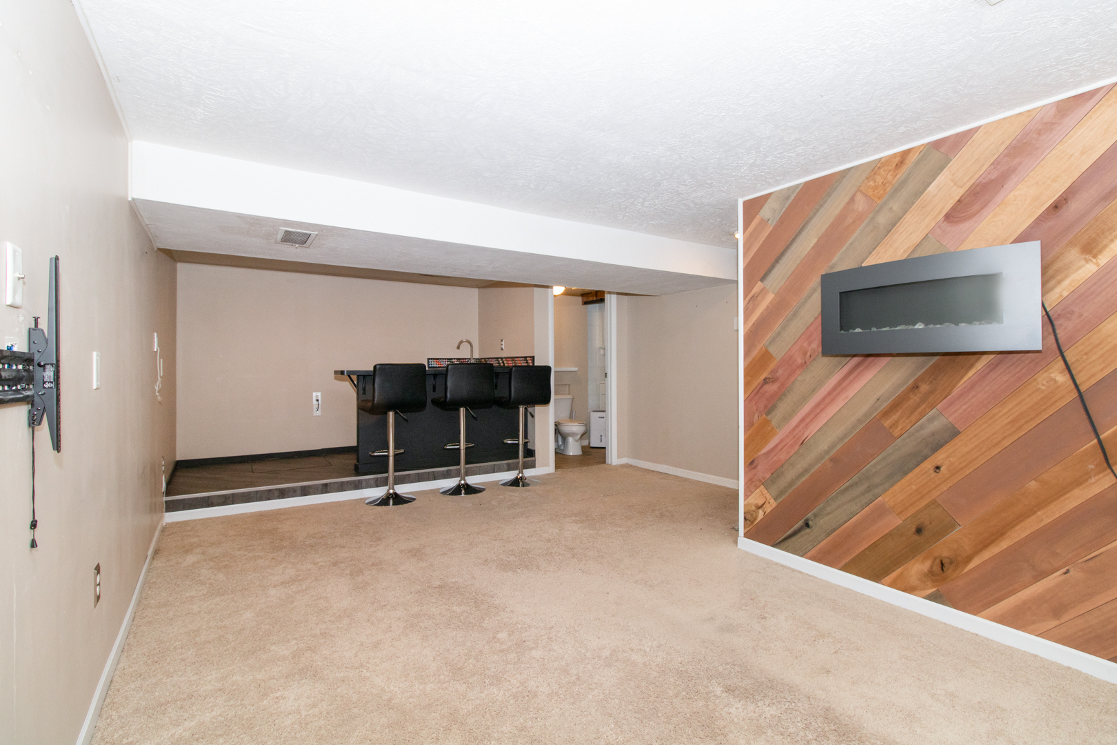 12 Timberview Drive Bloomington, IL 61701 - Photo 28 of 40 a view of a room with gym equipment