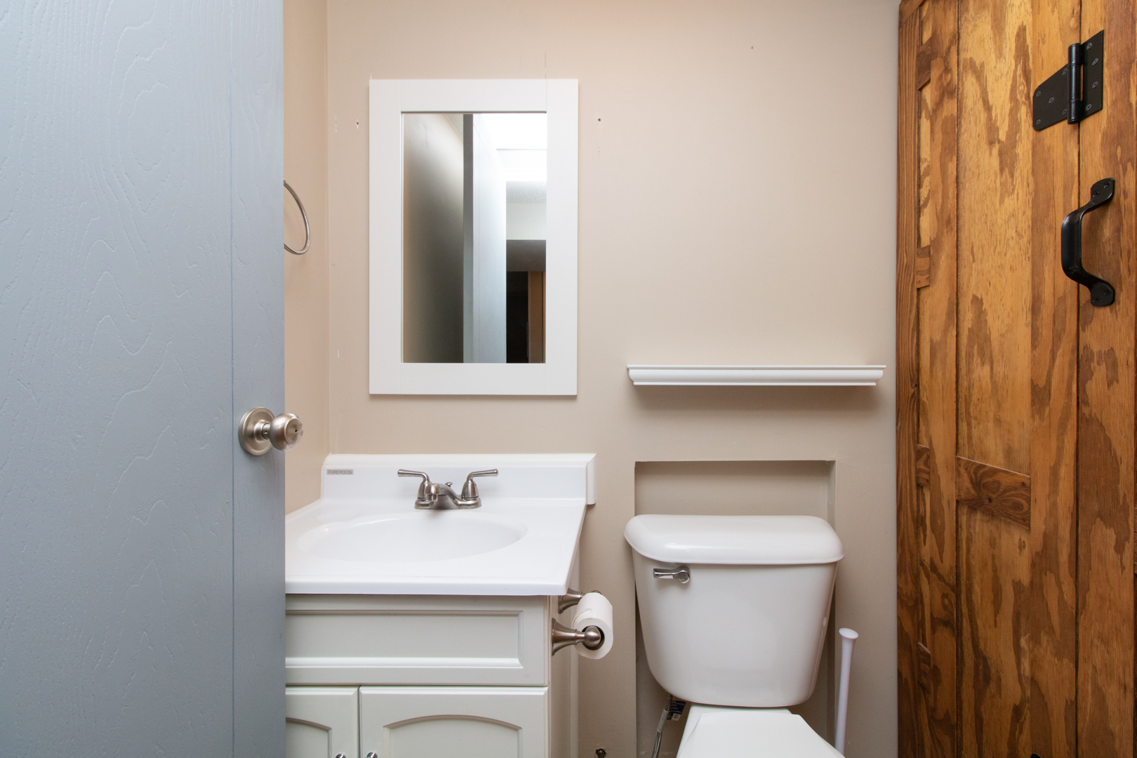 12 Timberview Drive Bloomington, IL 61701 - Photo 30 of 40 a bathroom with a toilet sink and mirror